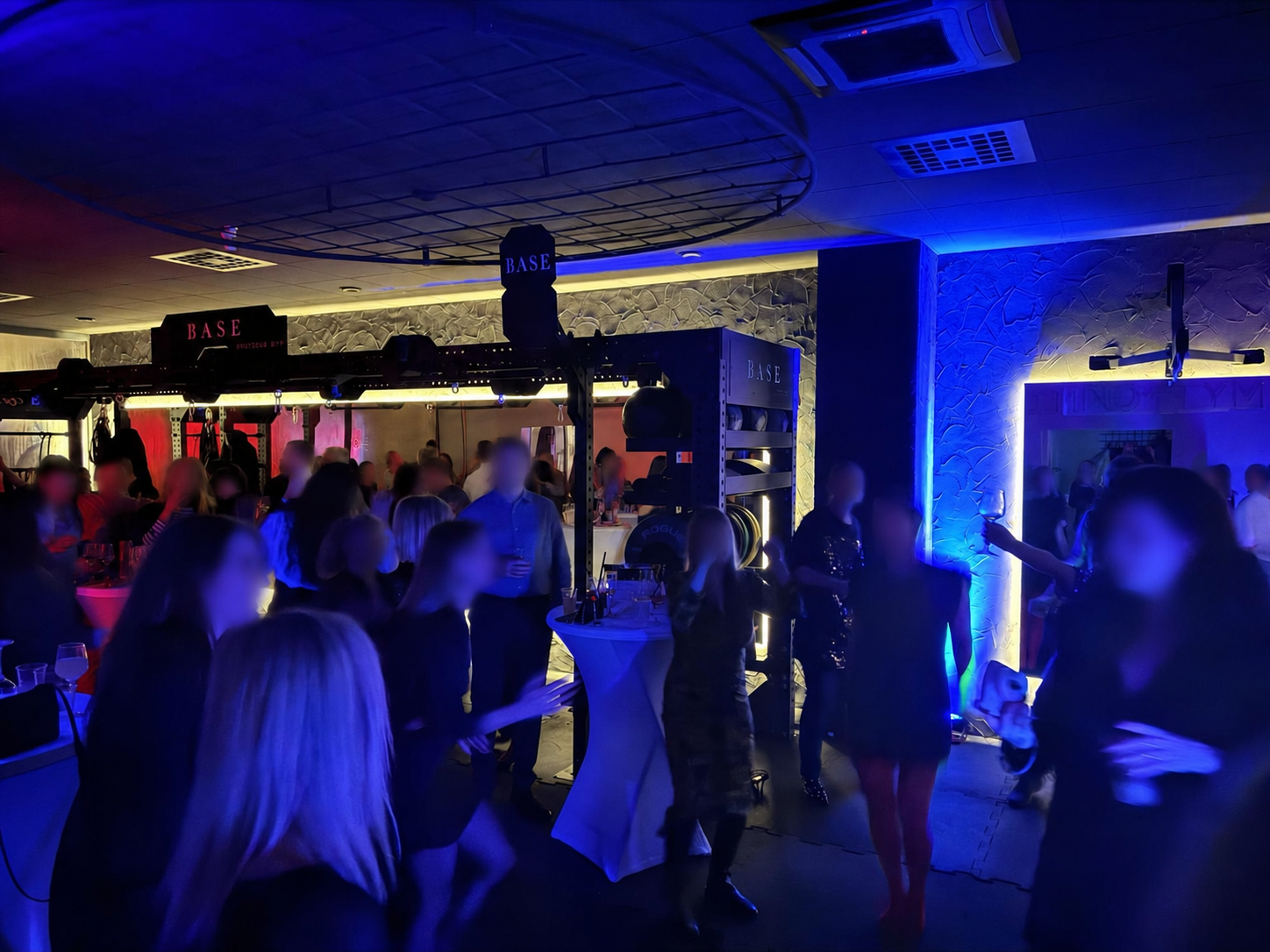 Guests enjoying the atmosphere at a Zagreb event with anonymized faces