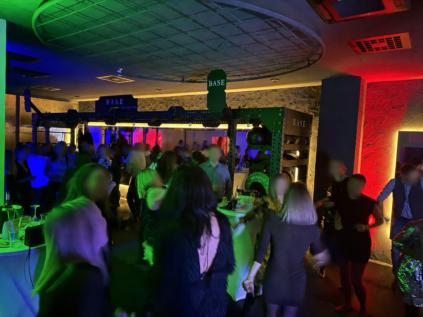 Colourful event lighting in use at a Zagreb venue with anonymized guests